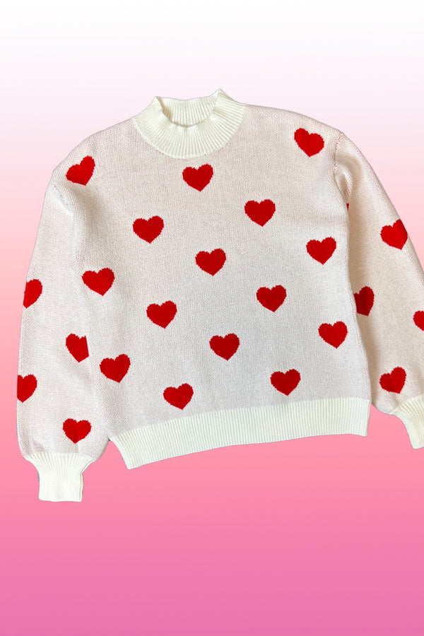 All over heart sweater