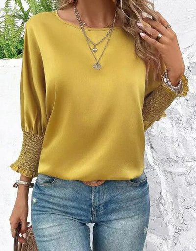 Smocked cuffs  Long sleeve blouse